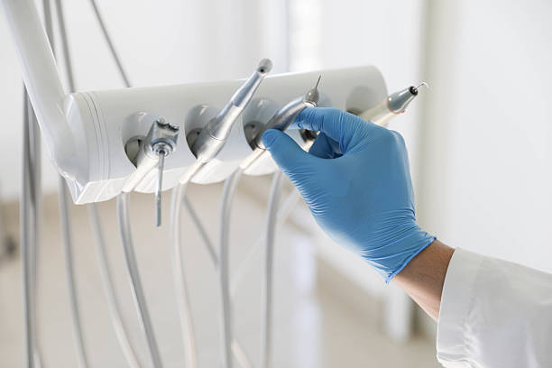 Professional Invisalign Clear Aligners technician working in Frisco, TX